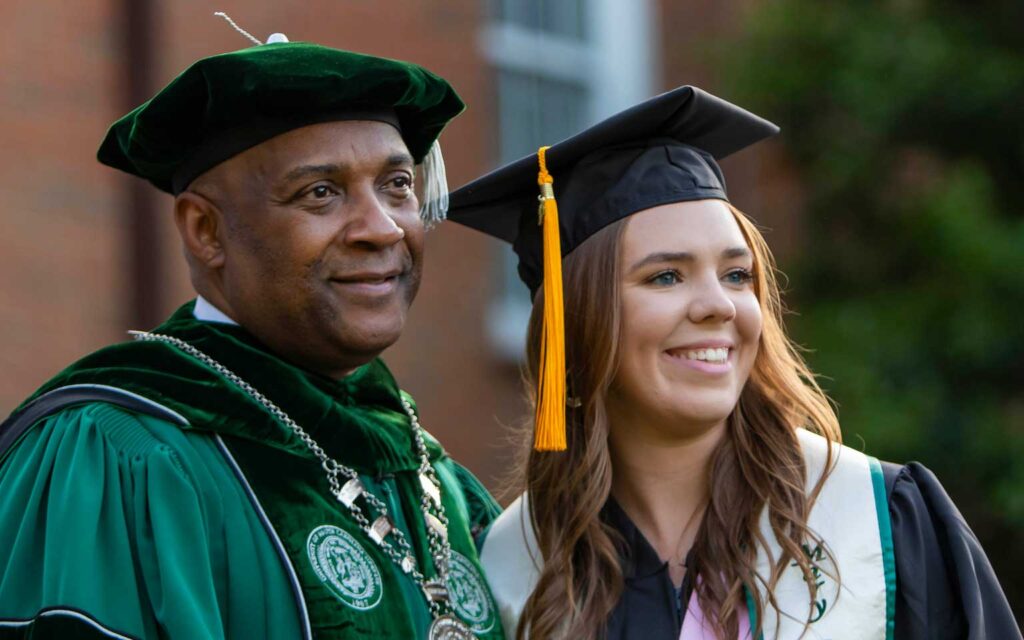 Commencement day. Student with Chancellor during the event