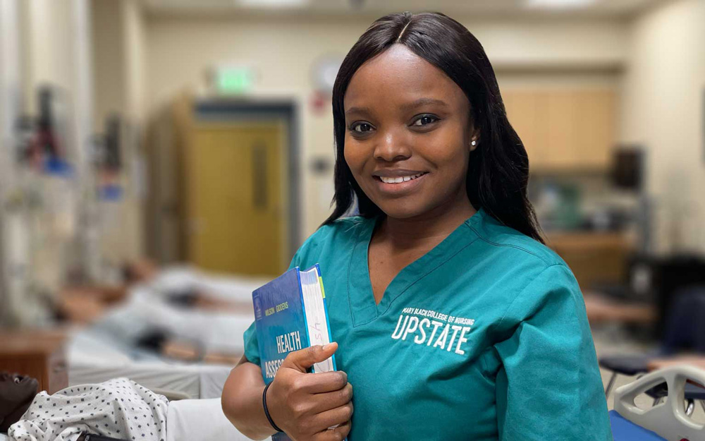 Photo of nursing student with a book