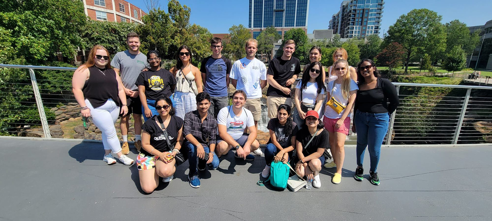 A group of students on a bridge