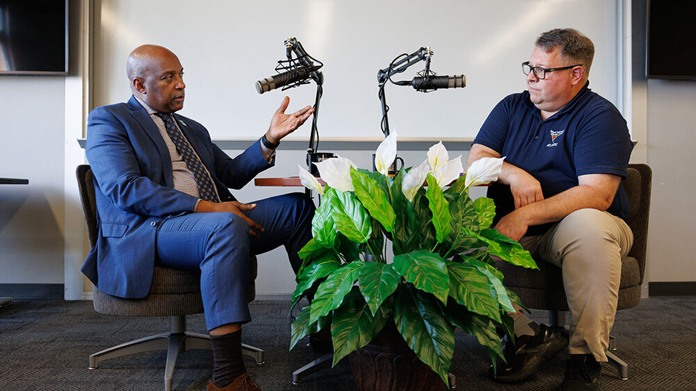 Photo of Benny Harris and Erik Gardner in podcast interview