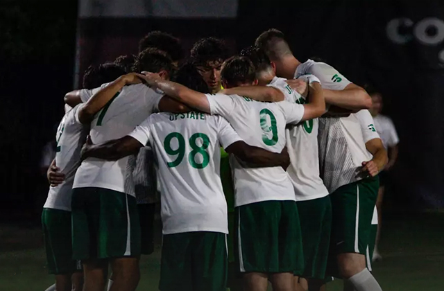 USC Upstate Men's soccer players in a huddle