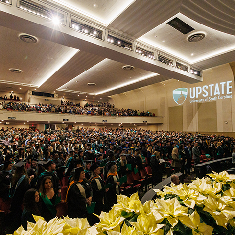 graduates at commencement in Spartanburg Memorial Auditorium