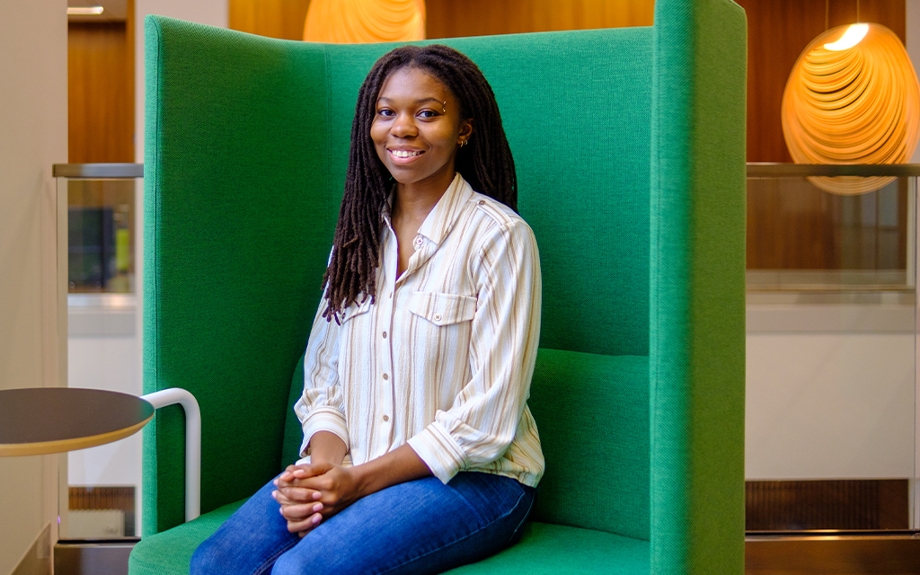 Arionna Grant seated in a chair