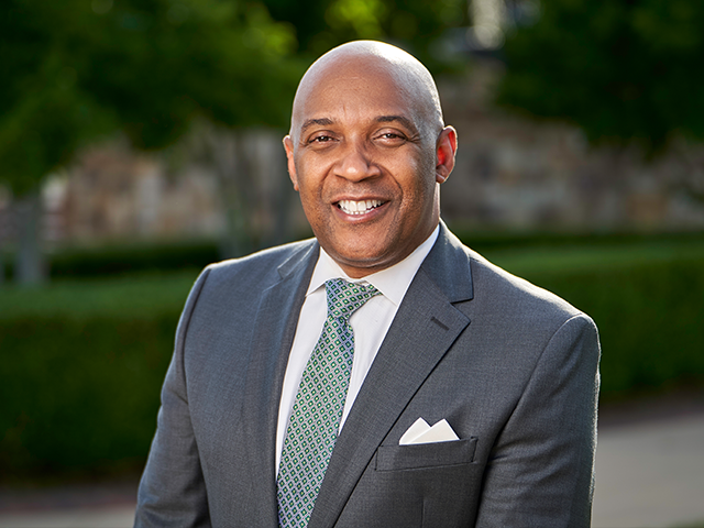 Dr. Bennie Harris smiles for the camera
