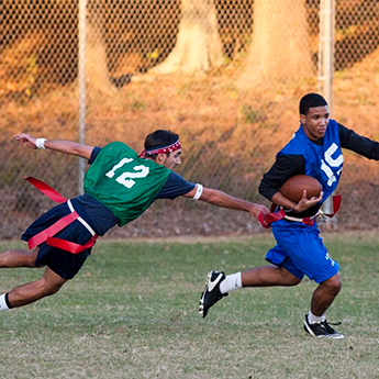 Students playing flag football